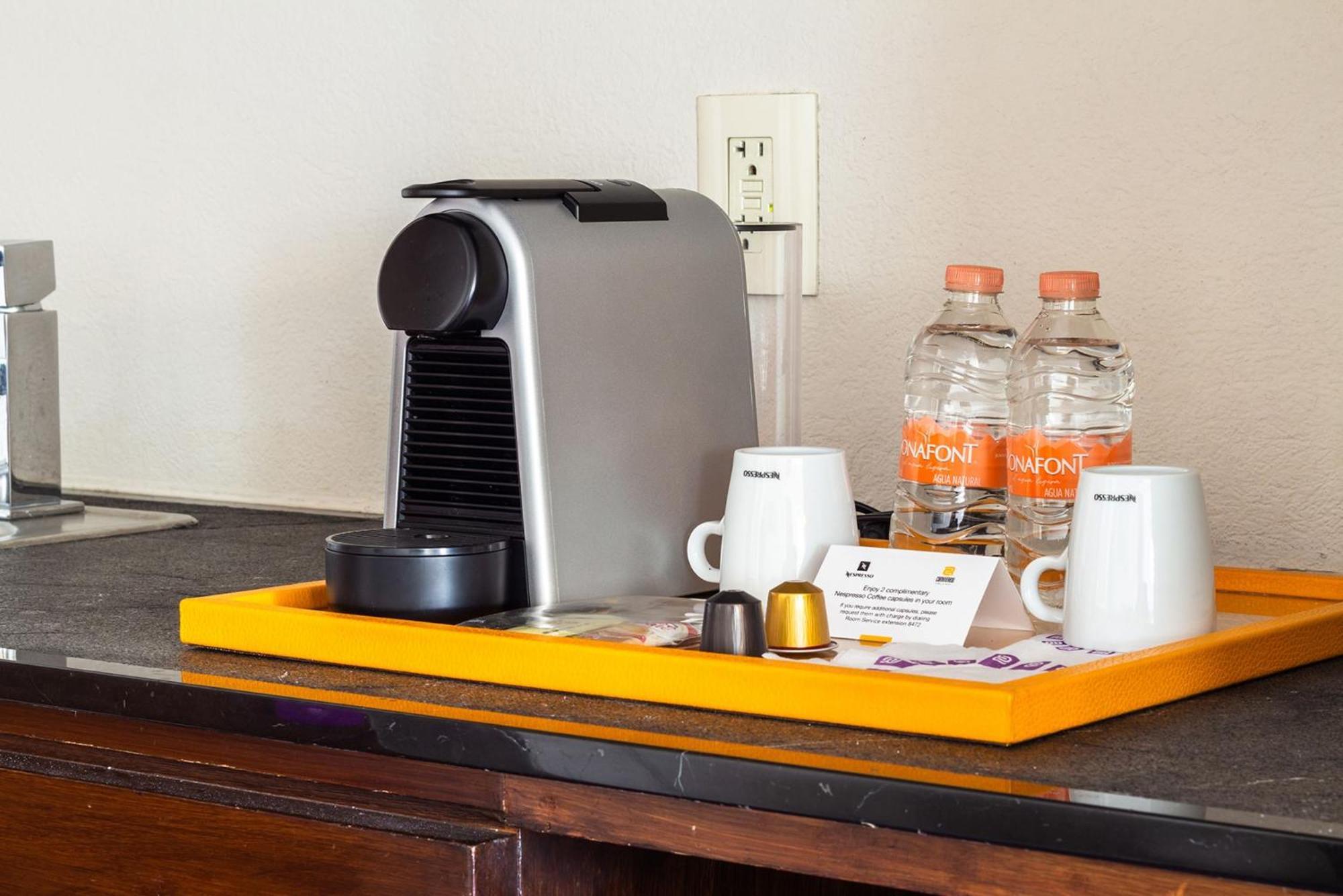 Camino Real Pedregal Mexico Hotel Exterior photo A Nespresso coffee machine in a hotel room
