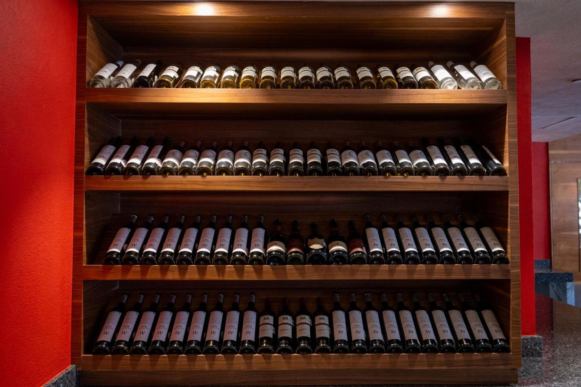 Camino Real Pedregal Mexico Hotel Exterior photo Wine bottles in a wine rack